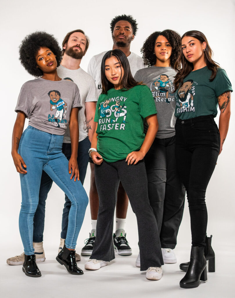 Six diverse male and female models wearing Underdog Apparel