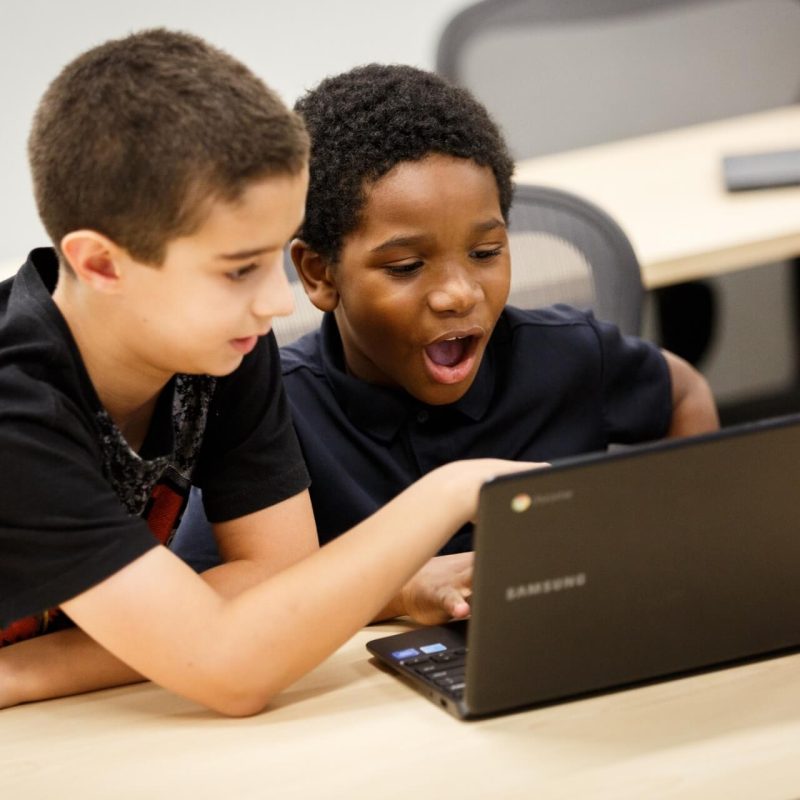 BePhilly_Foundation_Photos_5 Two male students on one computer at a desk engaged with their activity